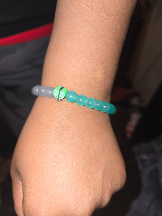 Green Ladybug Glass Bead Bracelet